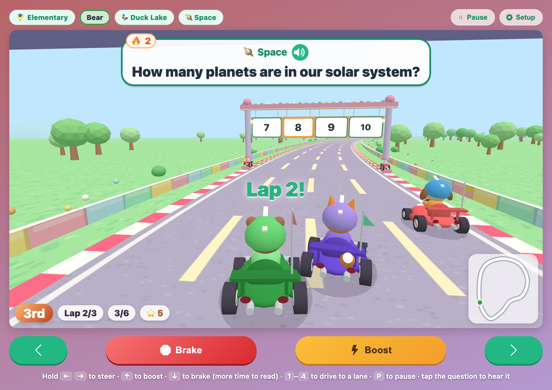 the Lap 2 sign popping up as the next gate asks how many planets are in our solar system, with signs 7, 8, 9 and 10
